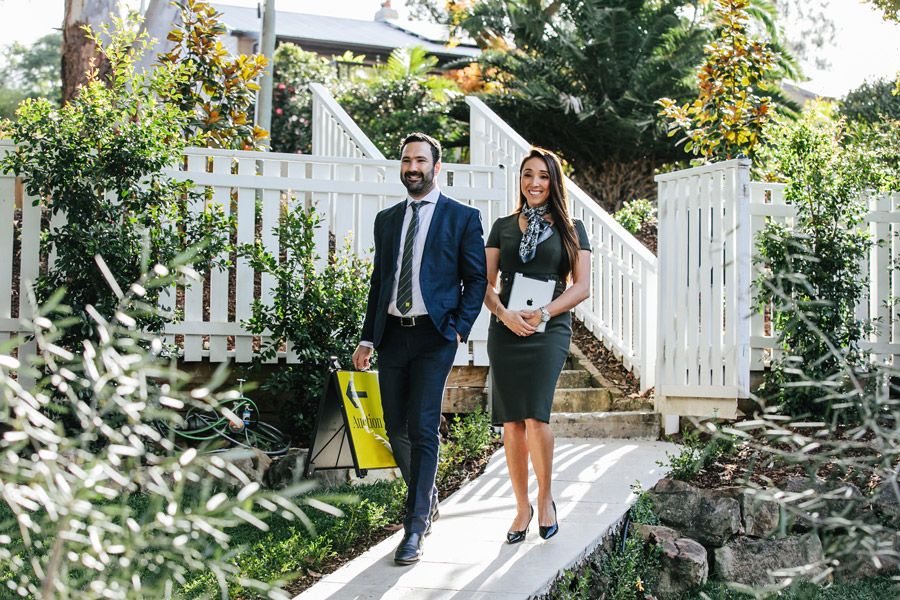 RayWhite_Two-agents-arriving-for-property-to-manage